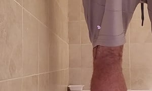 Big and smelly farts in grey shorts before a poop