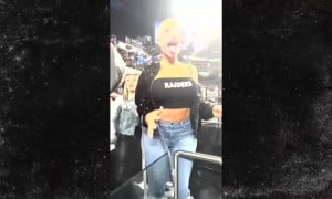  model Danii Banks is kicked out of NFL stadium for flashing her boobs